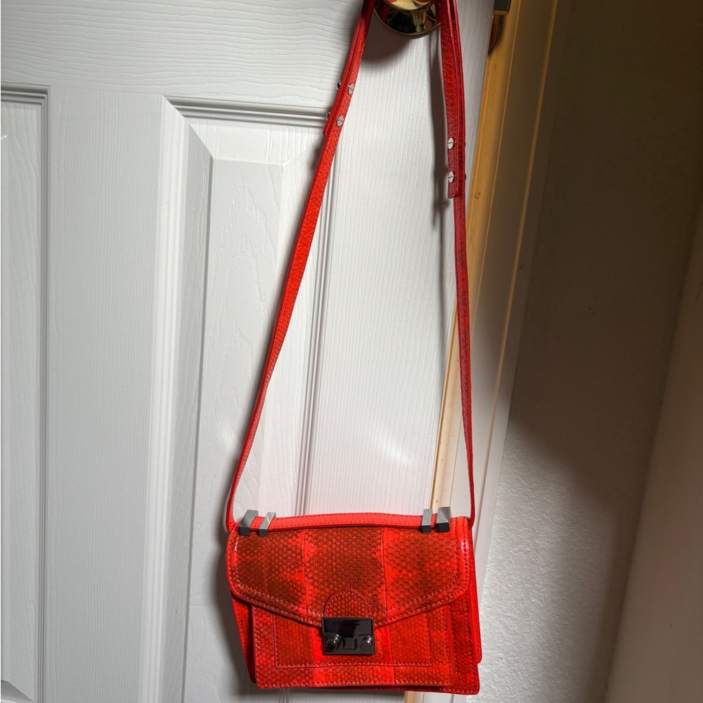 NWT loeffler Randall orange snakeskin purse